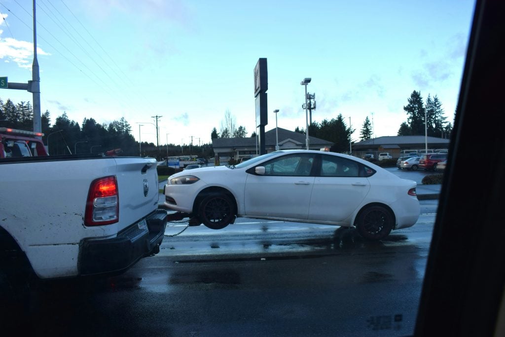 towing white car